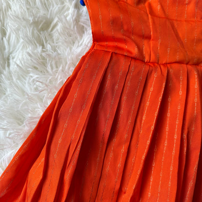 Majestic Waves: Orange Frock with Golden zari border