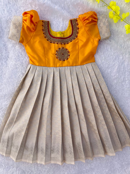 Stunning Frock with Aariwork Yoke and Pleated Skirt