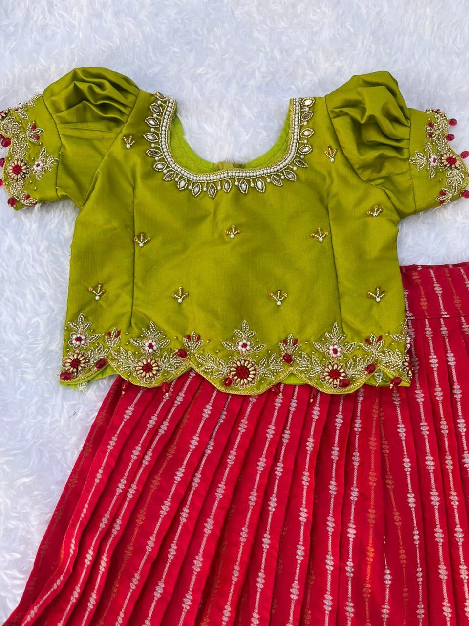 Vibrant Kids' Ensemble: Red Skirt, Parrot Green Top with Aari Work